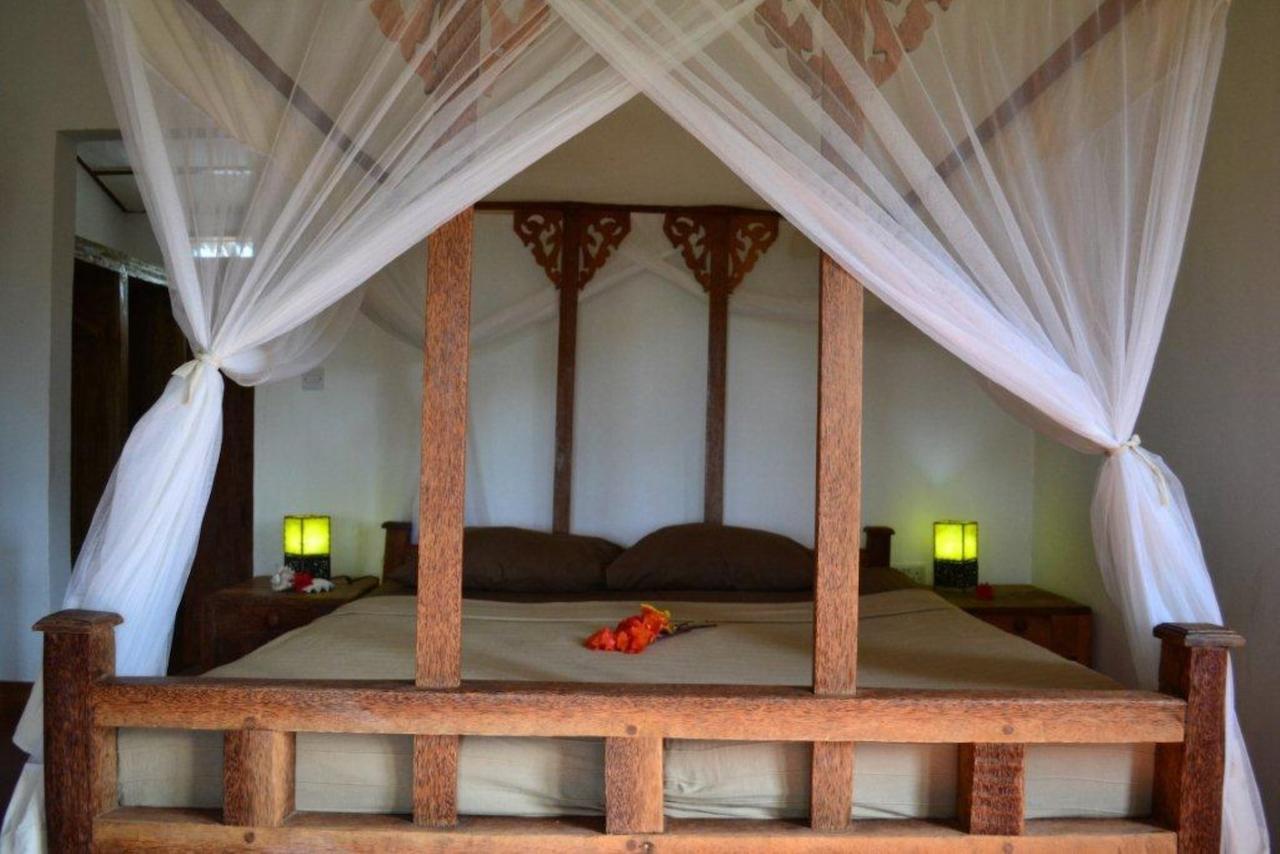 Emerald Bay Resort Kizungu Quarto foto
