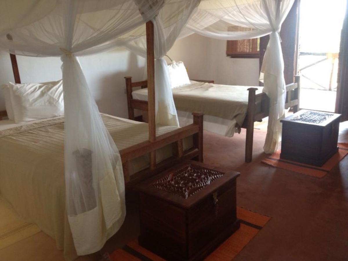 Emerald Bay Resort Kizungu Quarto foto